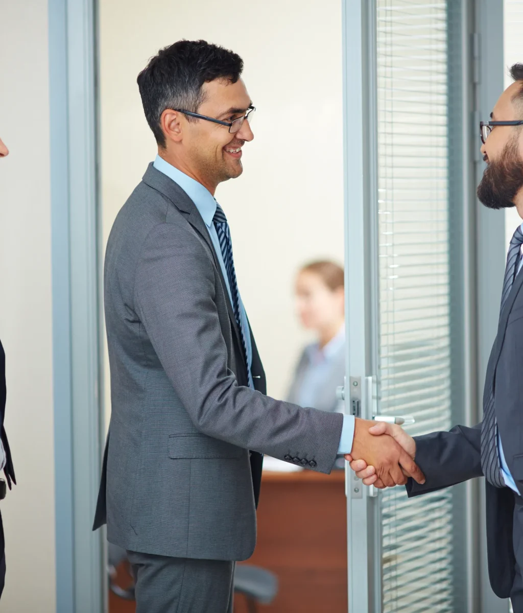 businessmen-closing-deal-with-handshake